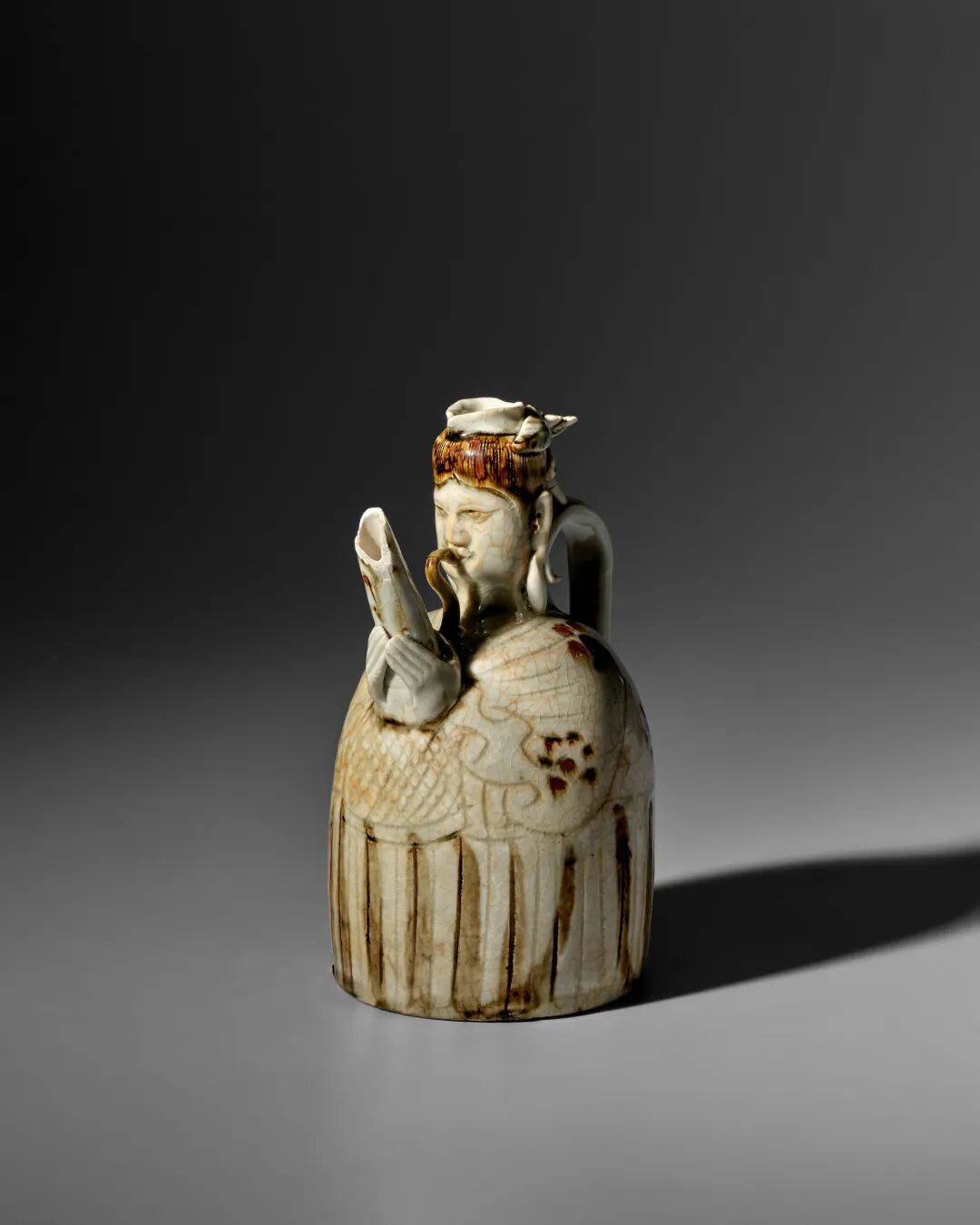 A VERY RARE BROWN-SPLASHED QINGBAI 'SHENG PLAYER' EWER Northern Song Dynasty image 1